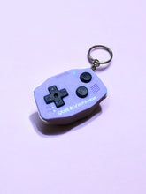 GBA-inspired AirTag holder Fidget toy in iconic purple
