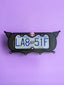 Kuromi x PopPlates — 3D printed gothic-kawaii license plate frame with pointed cat ears and pink skull accent, made in Vancouver BC