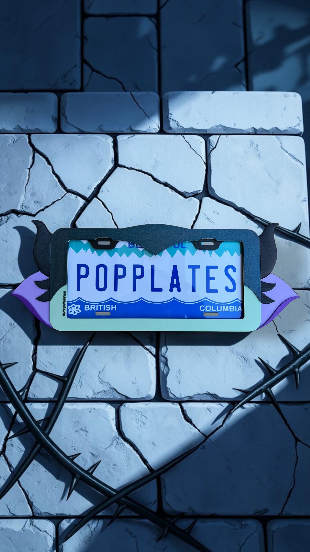 Dark Fairy Mistress x PopPlates — 3D printed fantasy villain license plate frame with sculpted horns and wing accents, made in Vancouver BC Main image