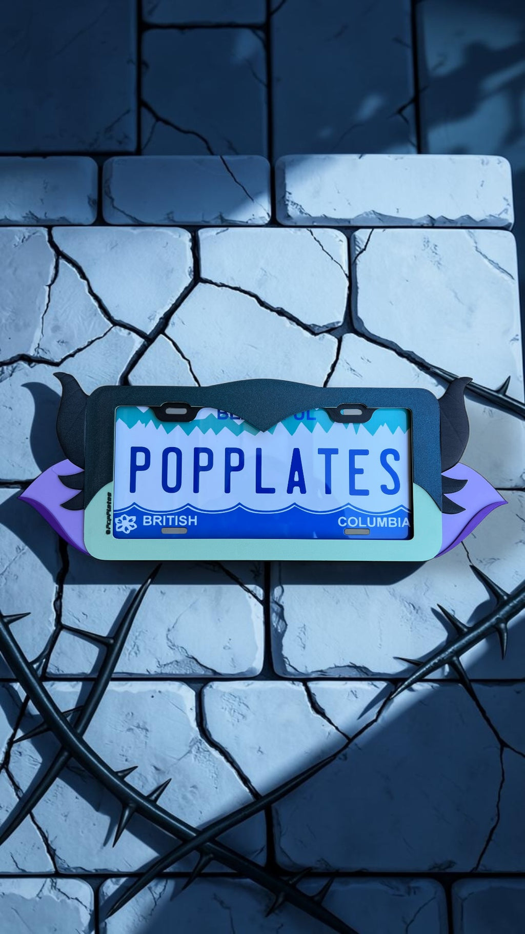 Dark Fairy Mistress x PopPlates — 3D printed fantasy villain license plate frame with sculpted horns and wing accents, made in Vancouver BC