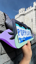 Dark Fairy Mistress x PopPlates — installed on vehicle rear license plate showing full fantasy villain design, made in Vancouver BC