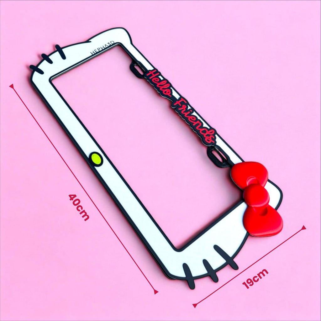 Hello Kitty x PopPlates — 3D printed kawaii license plate frame with bow and cat ear details, available in red and pink, made in Vancouver BC