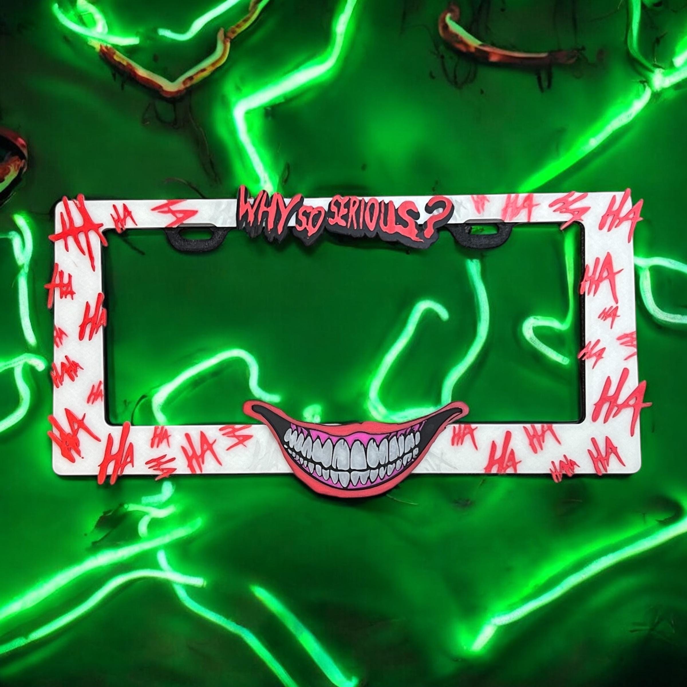 Menacing Joker x PopPlates — 3D printed glow-in-the-dark villain license plate frame with Joker face and playing card details, made in Vancouver BC Main image