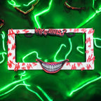 Menacing Joker x PopPlates — 3D printed glow-in-the-dark villain license plate frame with Joker face and playing card details, made in Vancouver BC