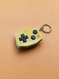 GBA-inspired AirTag holder Fidget toy in luxurious gold