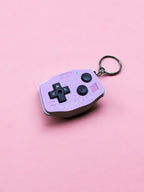 GBA-inspired AirTag holder Fidget toy in cutesy pink