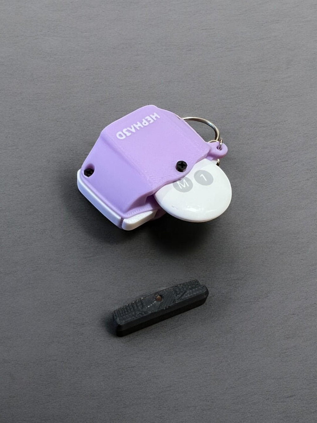 GBA-inspired AirTag holder Fidget toy with holder slot open