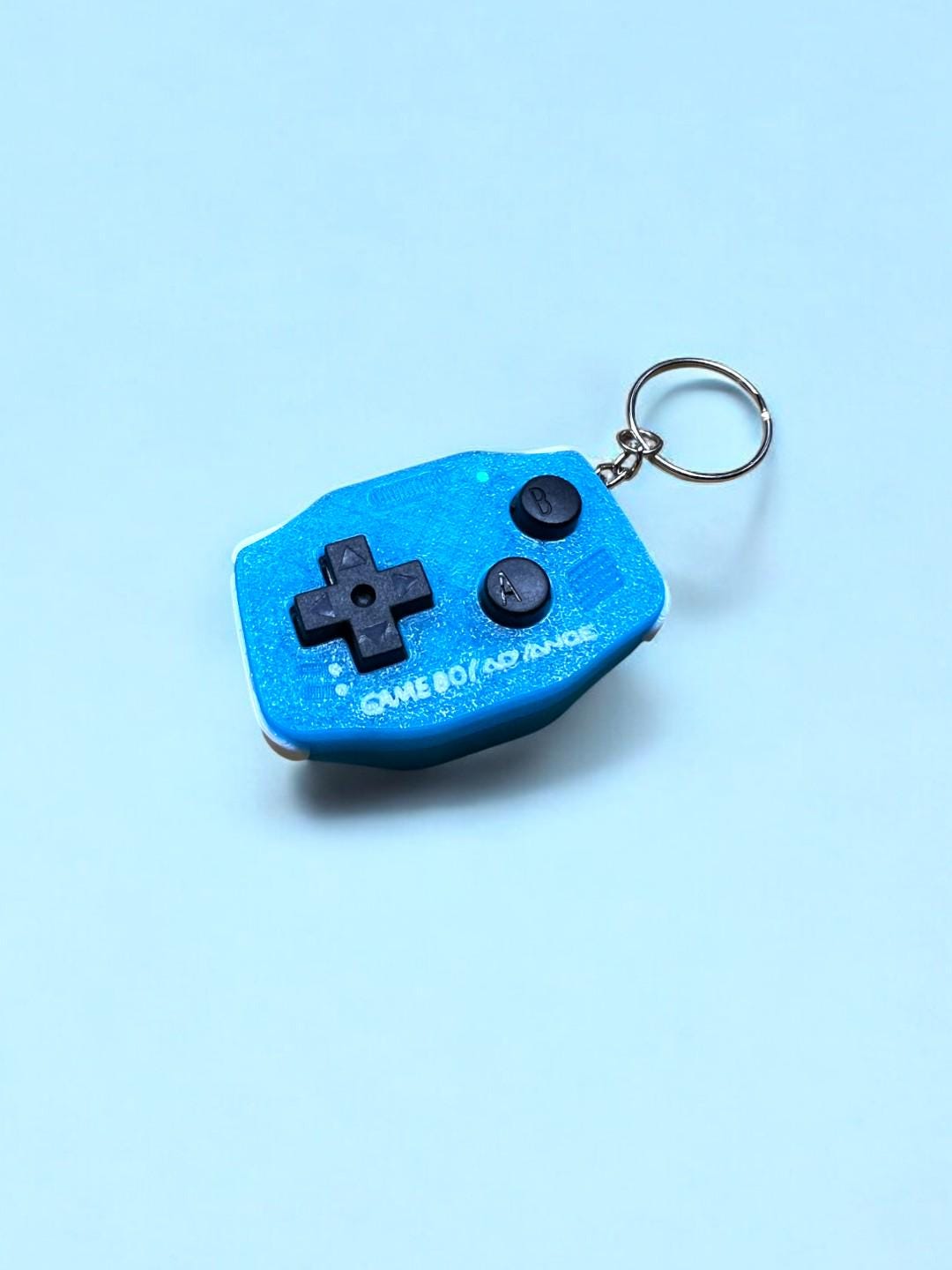 GBA-inspired AirTag holder Fidget toy in Glacial Blue