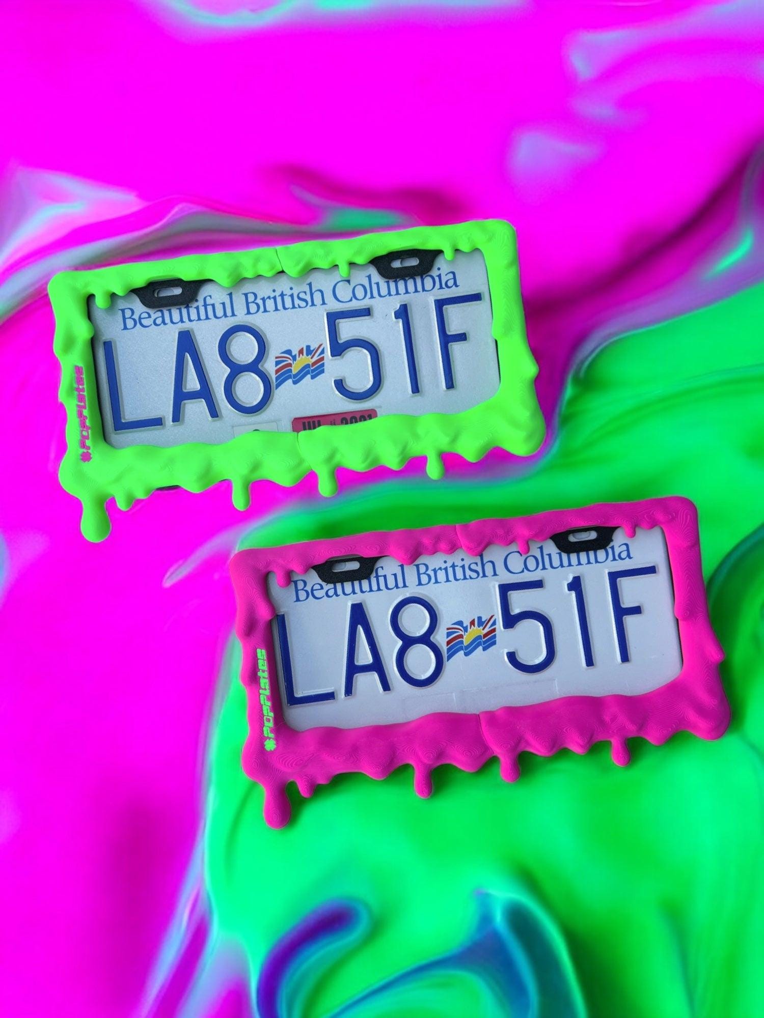 Toxic Goop x PopPlates — 3D printed original license plate frame with dramatic dripping slime effect, available in neon green and magenta, made in Vancouver BC Main image