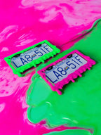 Toxic Goop x PopPlates — 3D printed original license plate frame with dramatic dripping slime effect, available in neon green and magenta, made in Vancouver BC