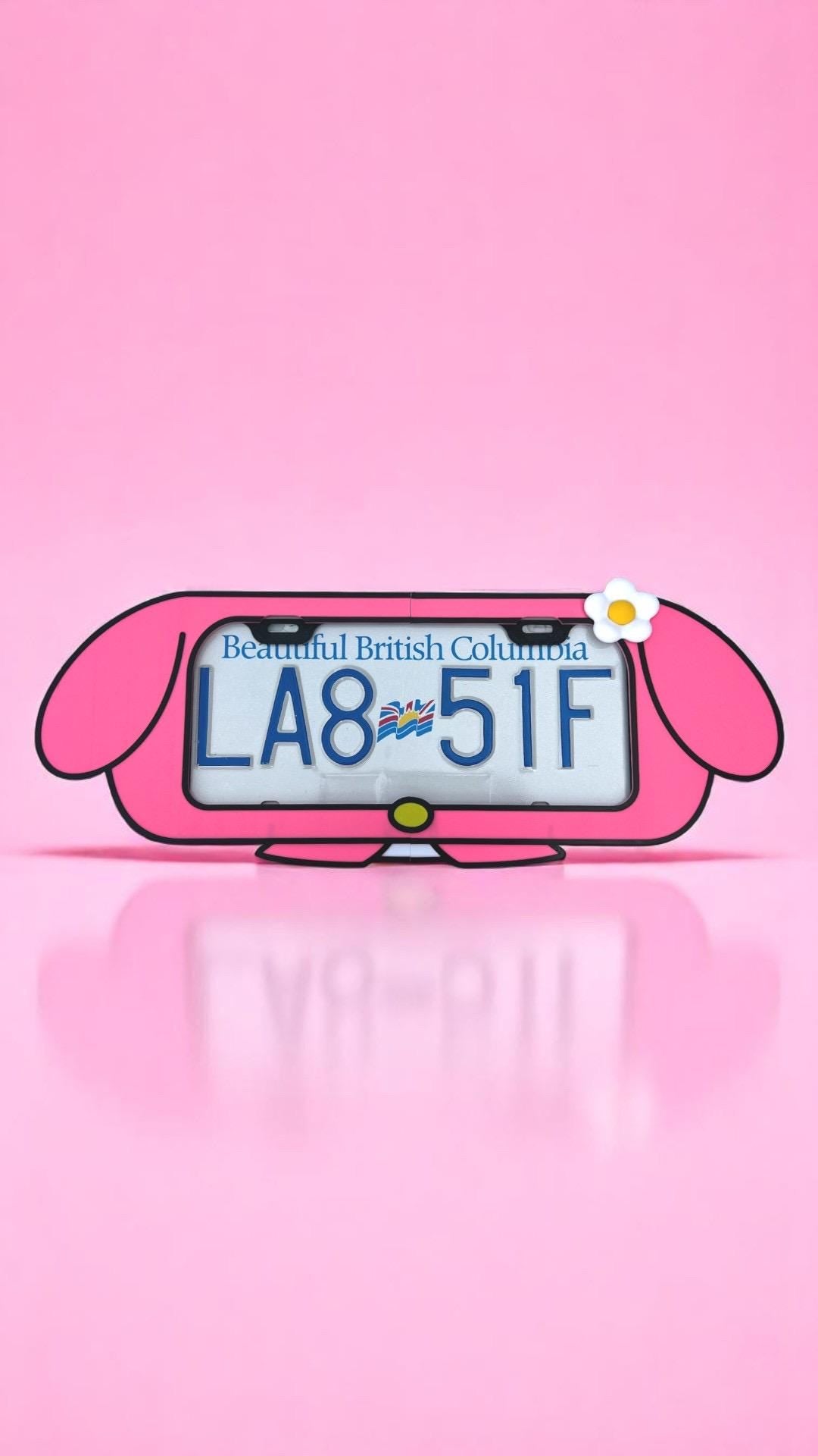 My Melody x PopPlates — 3D printed kawaii Sanrio-inspired license plate frame with hood and flower details, made in Vancouver BC