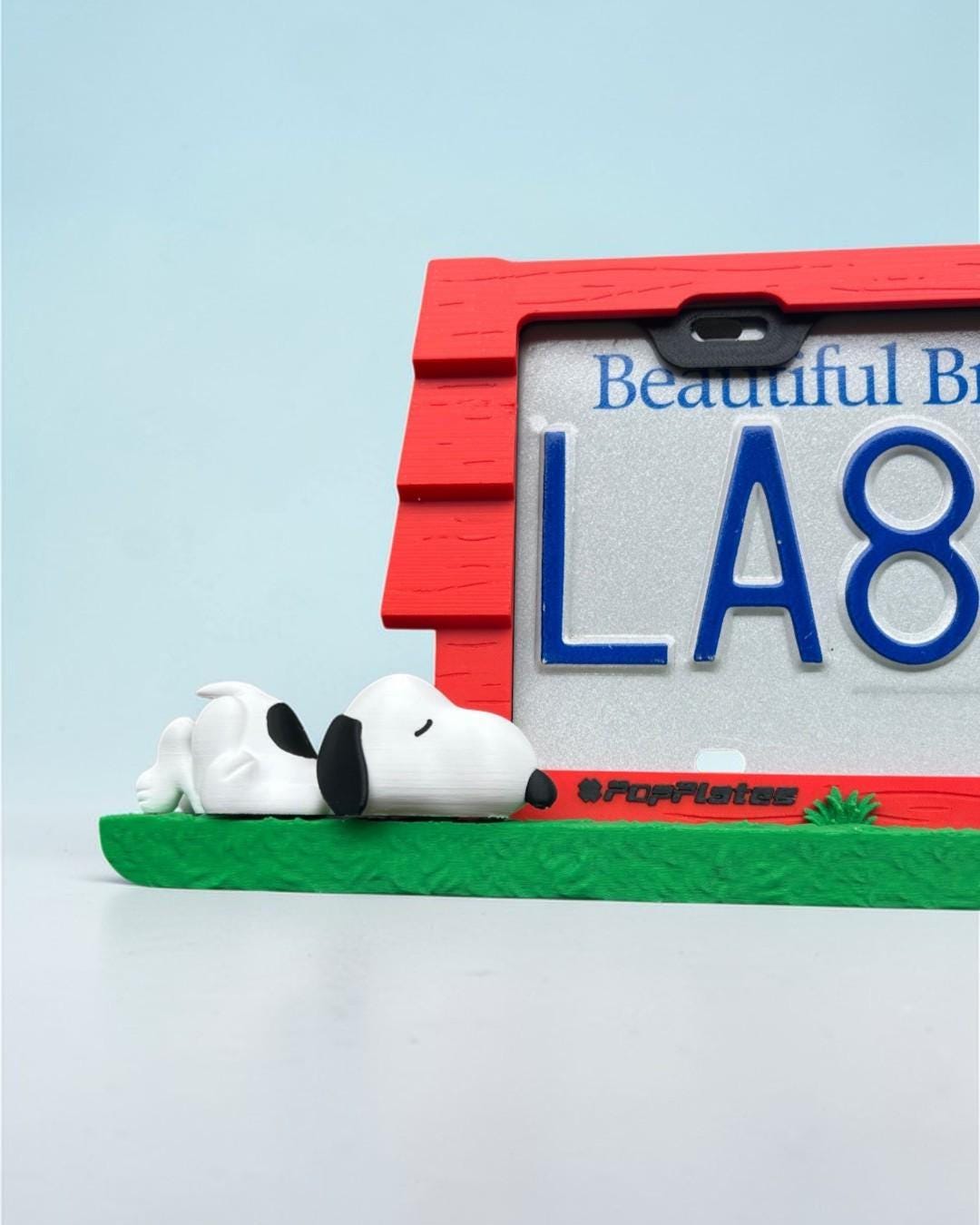 Snoopy Inspired PopPlate | Premium 3D License Plate Frame | Cute Doghouse Car Accessory | Napping Puppy Auto Decor